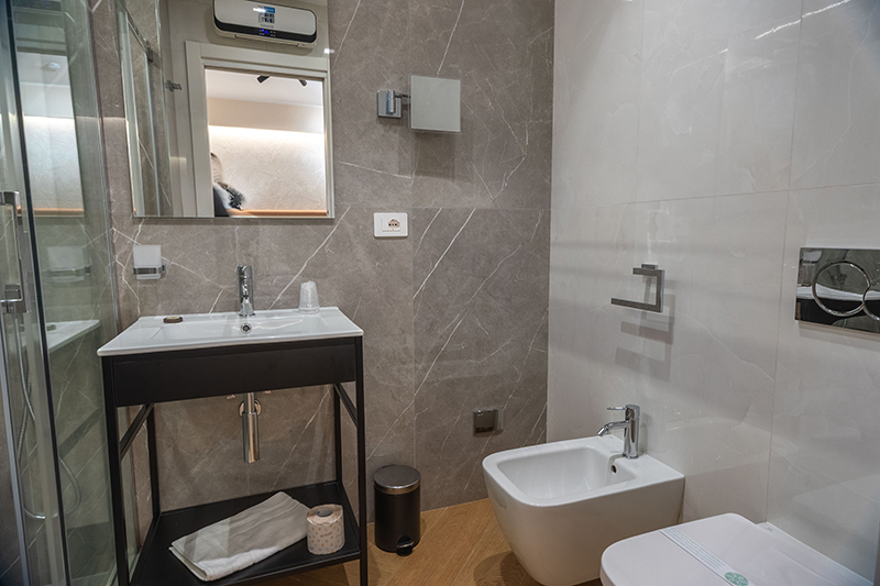 Flat-Urban Suites camera con bagno privato